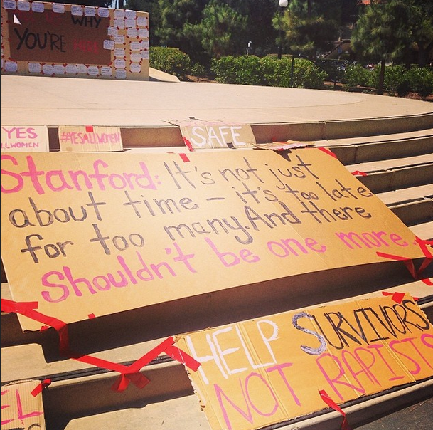Posters for the Stand With Leah rally in White Plaza.