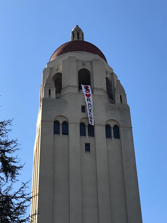 Coalition of Concerned Children Hoist a Banner