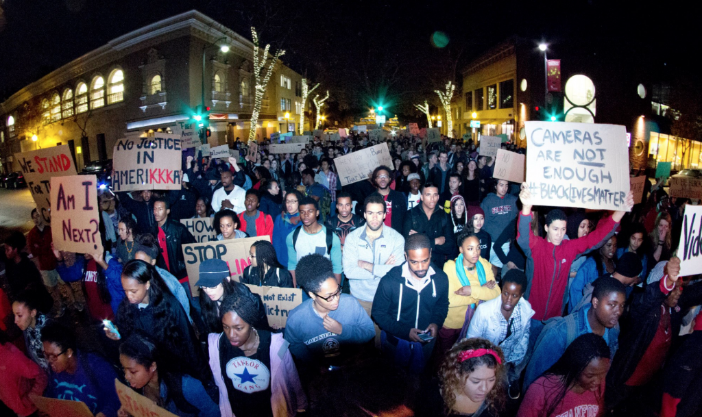 Stanford Students protest in downtown Palo Alto over recent police shootings.