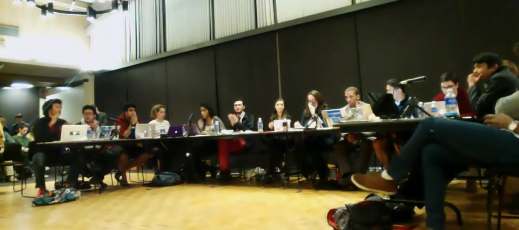 The student senate applauds during the divestment vote in February. Source: Stanford Out of Occupied Palestine YouTube LiveStream 